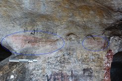 While the pigments circled in blue in this photograph showed different characteristics to the rest of the paintings in Ghar Hasan, they were too heavily damaged to accurately date. However, the fact that one of the paintings frames a doorway likely cut in the Classical period suggests they may be ancient, but not prehistoric.